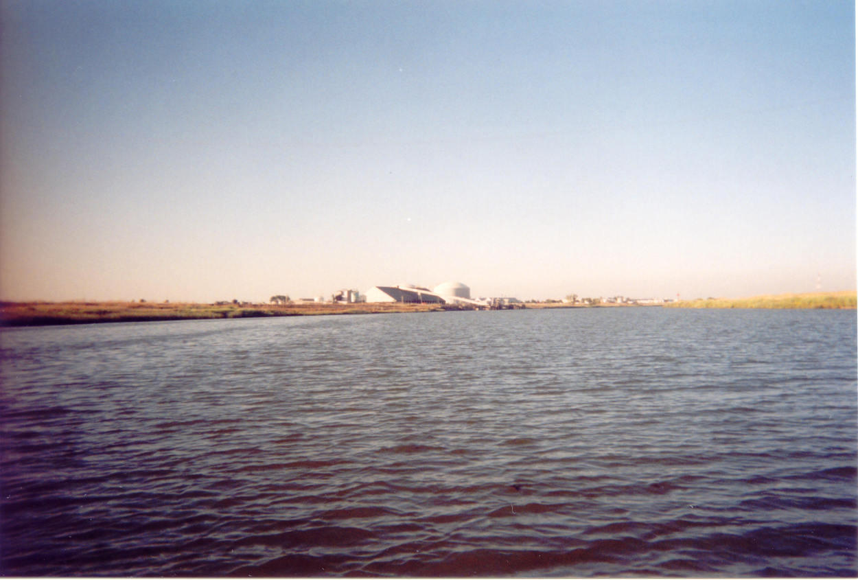 There is a fertilizer plant a couple miles up stream from the port